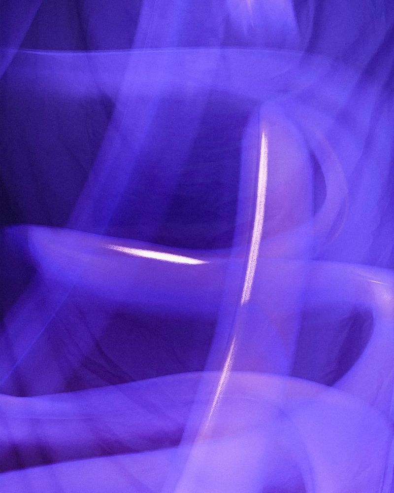 Abstract golden lines representing body flexibility and energy flow